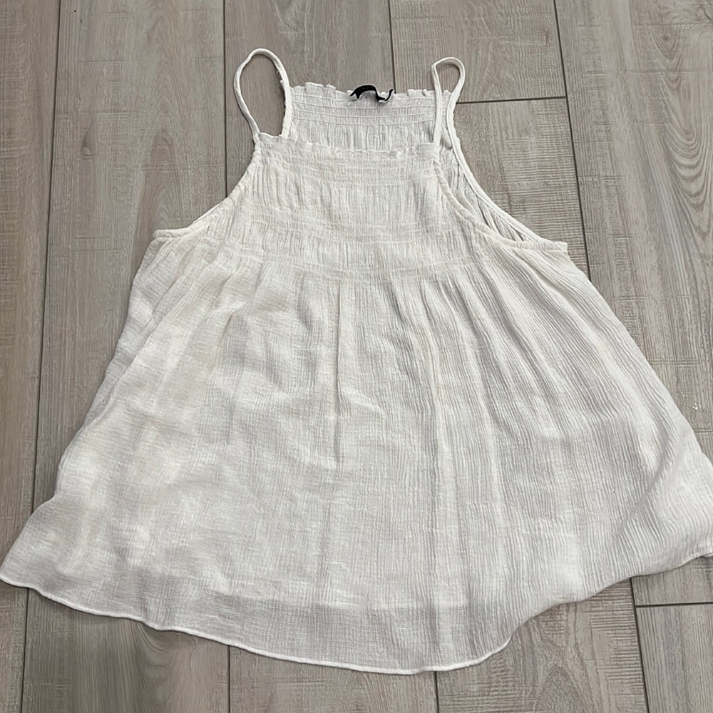 White flowy tank.